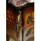 Commode style Louis XV ventrue en bois de rose