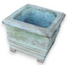 Square planter with bronze floral decoration