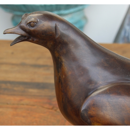 Bronze heather cockerel on a red marble plinth