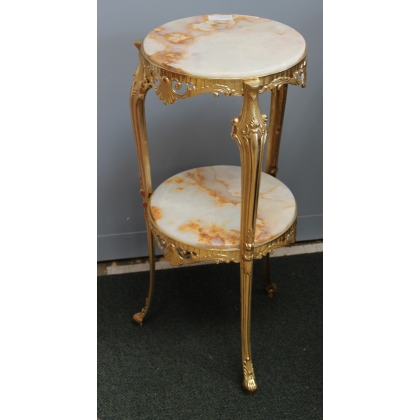 Small round table in polished brass with two tiers