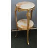 Small round table in polished brass with two tiers