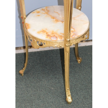 Small round table in polished brass with two tiers