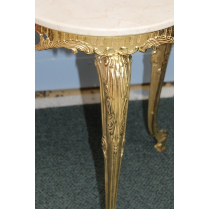 Small round table in polished brass, with a marble top