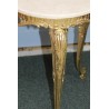 Small round table in polished brass, with a marble top
