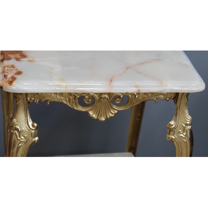 Small square table in polished brass with two tops