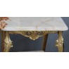 Small square table in polished brass with two tops
