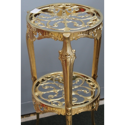 Polished brass plant stand with two shelves