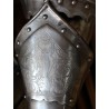 Engraved iron armour depicting St George slaying the dragon