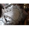 Engraved iron armour depicting St George slaying the dragon