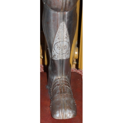 Engraved iron armour depicting St George slaying the dragon