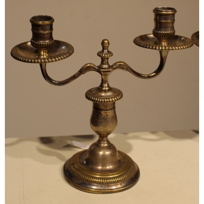 A pair of silver-plated bronze two-candle candlesticks