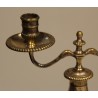 A pair of silver-plated bronze two-candle candlesticks