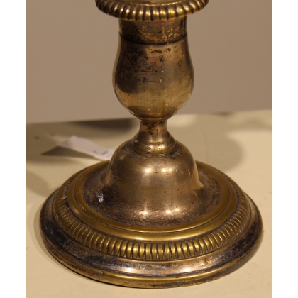 A pair of silver-plated bronze two-candle candlesticks