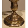 A pair of silver-plated bronze two-candle candlesticks