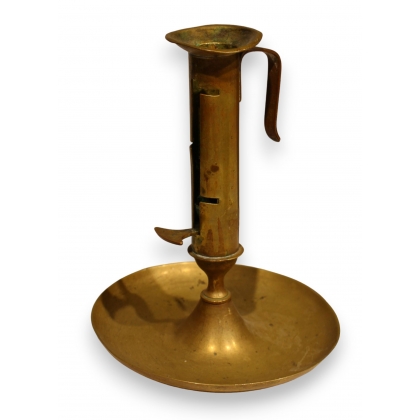 Adjustable brass bowl-shaped candle holder