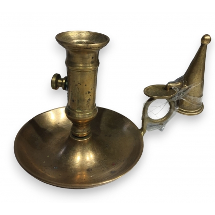 Brass bowl-shaped candle holder with a candle snuffer