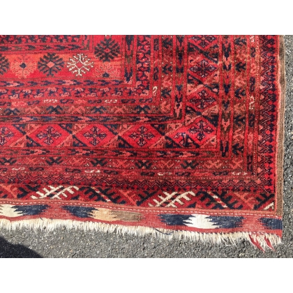 Bukhara carpet with a red background