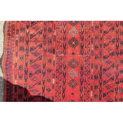 Bukhara carpet with a red background