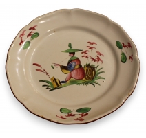 Assiette en faïence "Au chinois" signée K
