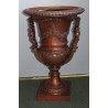Pair of bronze vases with female handles
