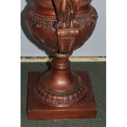 Pair of bronze vases with female handles