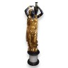 Rebecca in gilded and blackened bronze, on a marble plinth