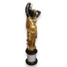 Rebecca in gilded and blackened bronze, on a marble plinth