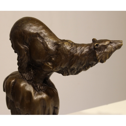 Bronze polar bear, on a black marble plinth