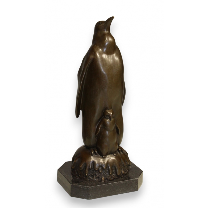 Bronze penguin and chick, on a marble plinth