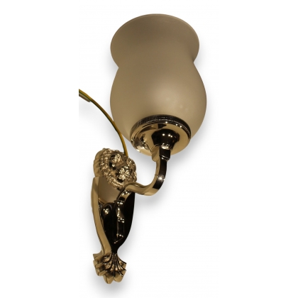 ‘Lion’s Head’ wall light in silver-plated bronze