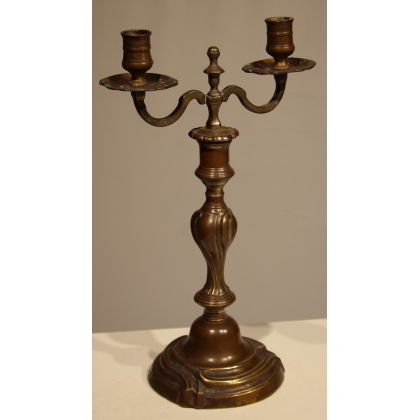A pair of Louis XV two-candle candlesticks