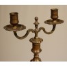 A pair of Louis XV two-candle candlesticks