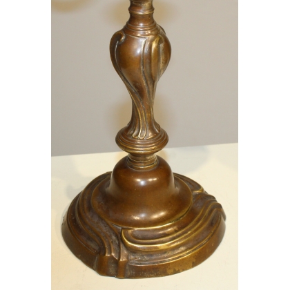 A pair of Louis XV two-candle candlesticks