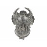 Crab-shaped door knocker in bronze with a green patina