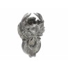 Crab-shaped door knocker in bronze with a green patina