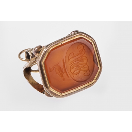 Seal set with a carved intaglio on carnelian