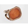 Seal set with a carved intaglio on carnelian