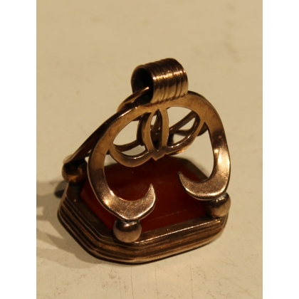 Seal set with a carved intaglio on carnelian