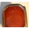 Seal set with a carved intaglio on carnelian