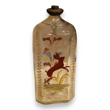 Bouteille en verre dite \"Flüeli\" décor Lapin