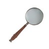 Magnifying glass with a wooden handle and silver-plated brass