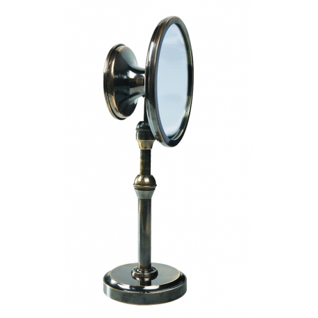 Miroir double avec un côté grossissant