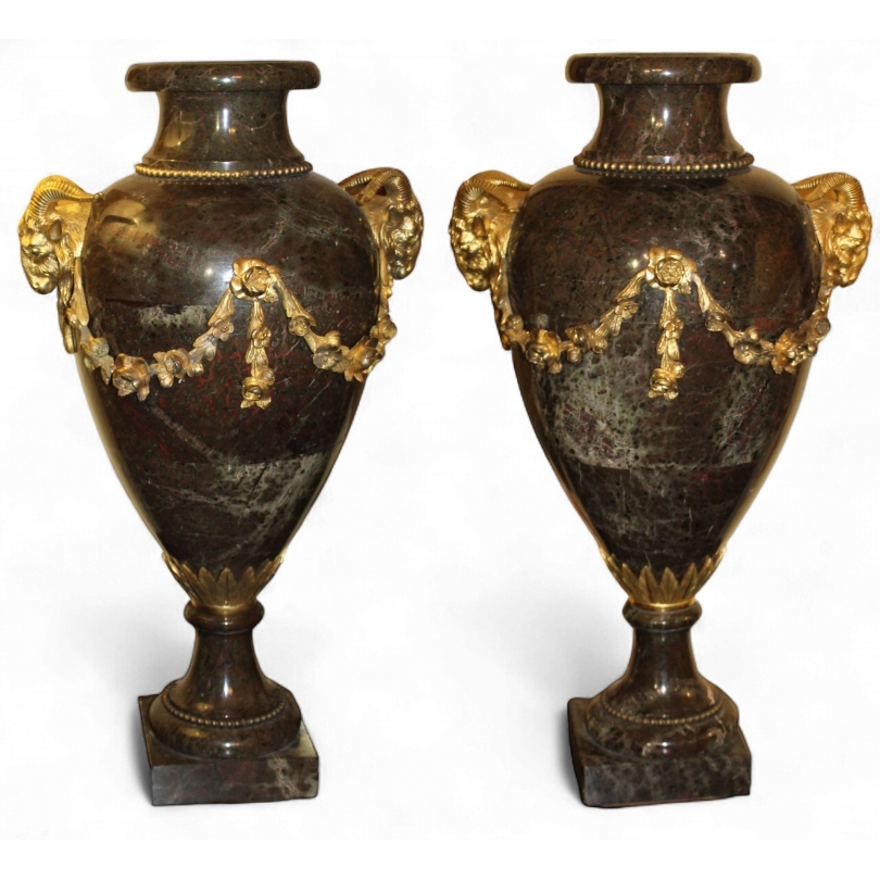A pair of Louis XVI marble vases decorated with bronze