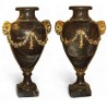 A pair of Louis XVI marble vases decorated with bronze