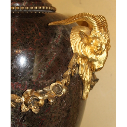 A pair of Louis XVI marble vases decorated with bronze