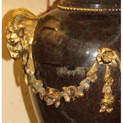 A pair of Louis XVI marble vases decorated with bronze