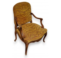 Fauteuil style Louis XV en noyer