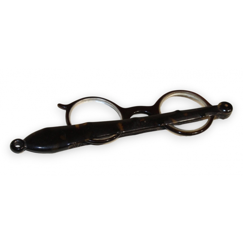 A pair of tortoiseshell glasses