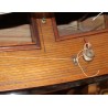 Model of a blue-hulled sailing boat