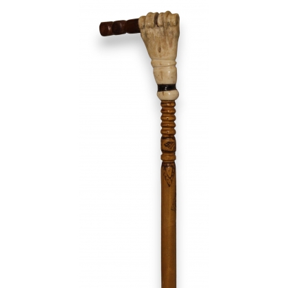 Walking stick with a handle made from ox phalanges and wood